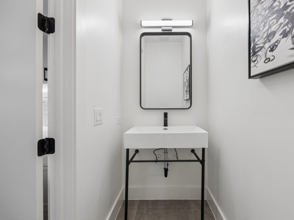 Interior view of powder bath sink and mirror at 4101 Menchaca Road, Austin, TX 78704