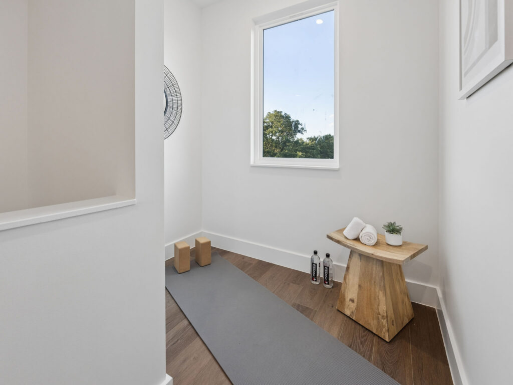 Interior view of modern townhome yoga space at 4101 Menchaca Road, Austin, TX 78704