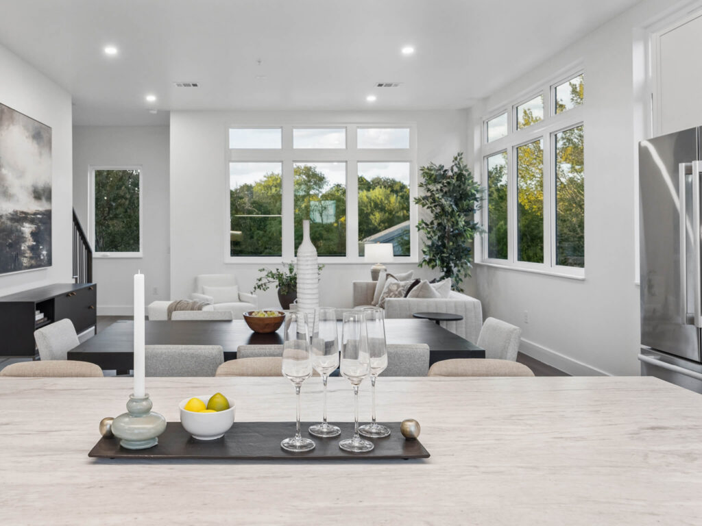 Interior view of the open-plan living room over the kitchen island at 4101 Menchaca Road, Austin, TX 78704