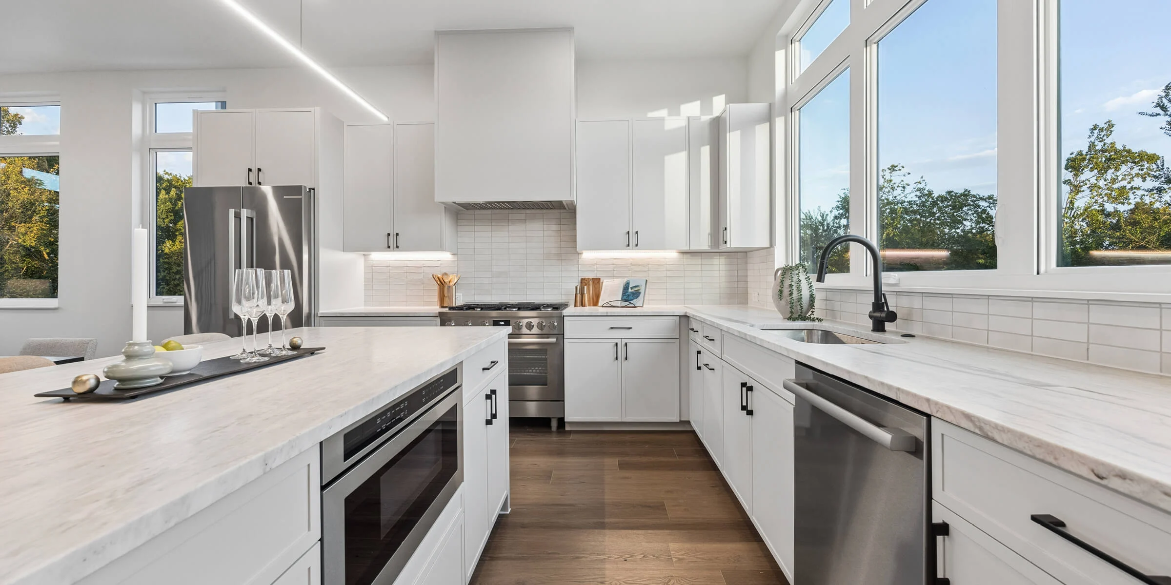 Interior view of the modern, light-filled kitchen at 4101 Menchaca Road, Austin, TX 78704