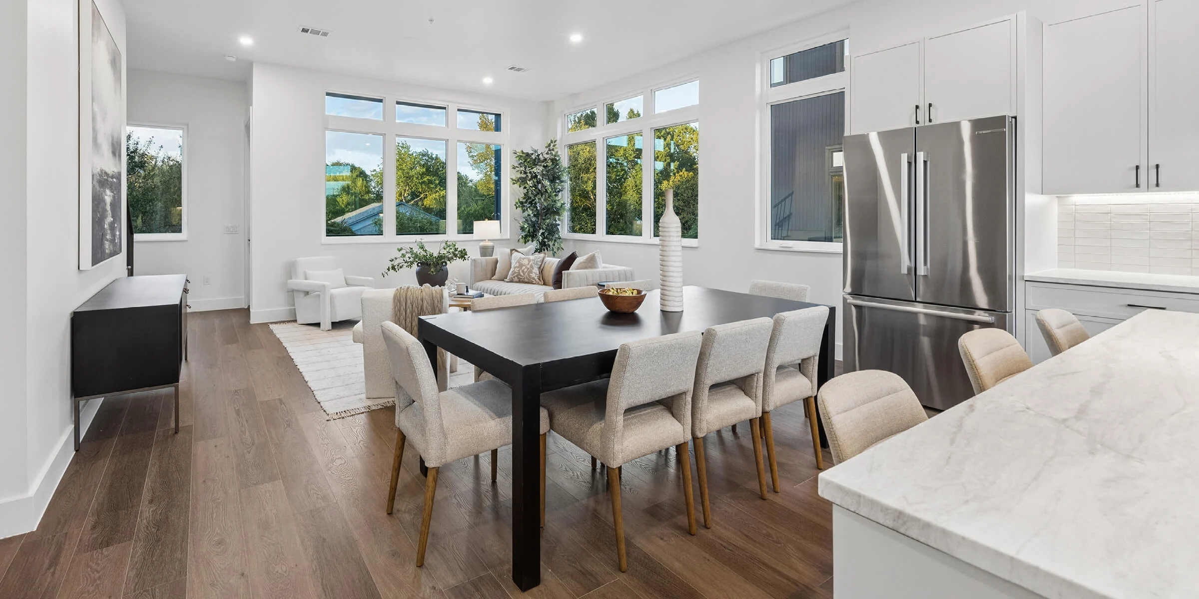 Interior view of the open-plan living room, dining room and kitchen at 4101 Menchaca Road, Austin, TX 78704